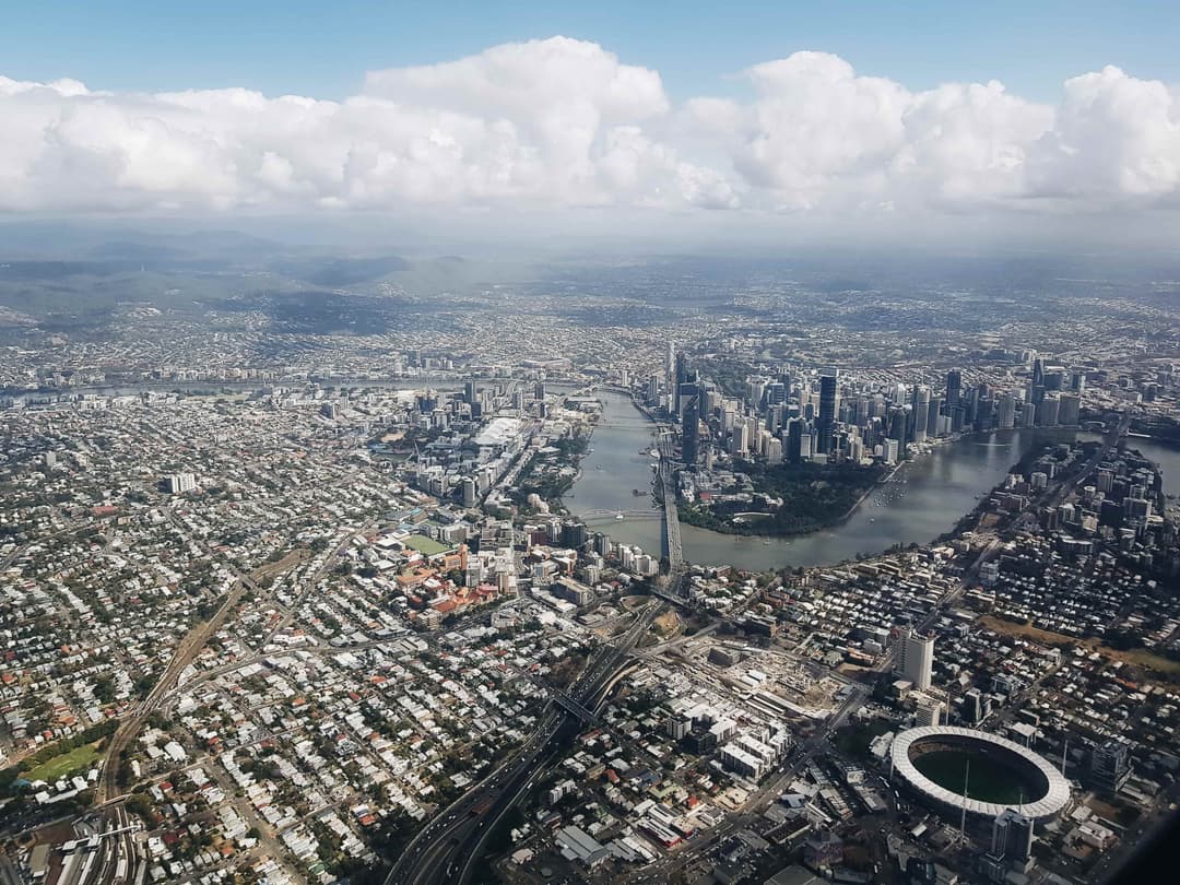 View of Brisbane city from airplane seat